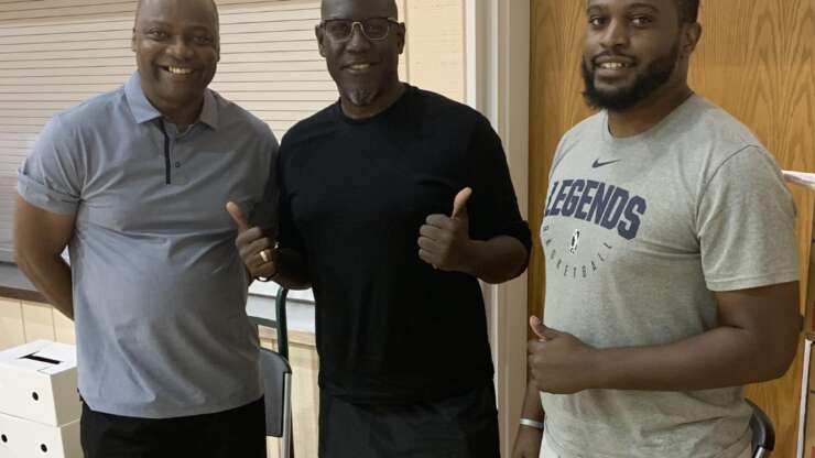 Coach Brown with Bouna Ndiaye and Mason Brawley